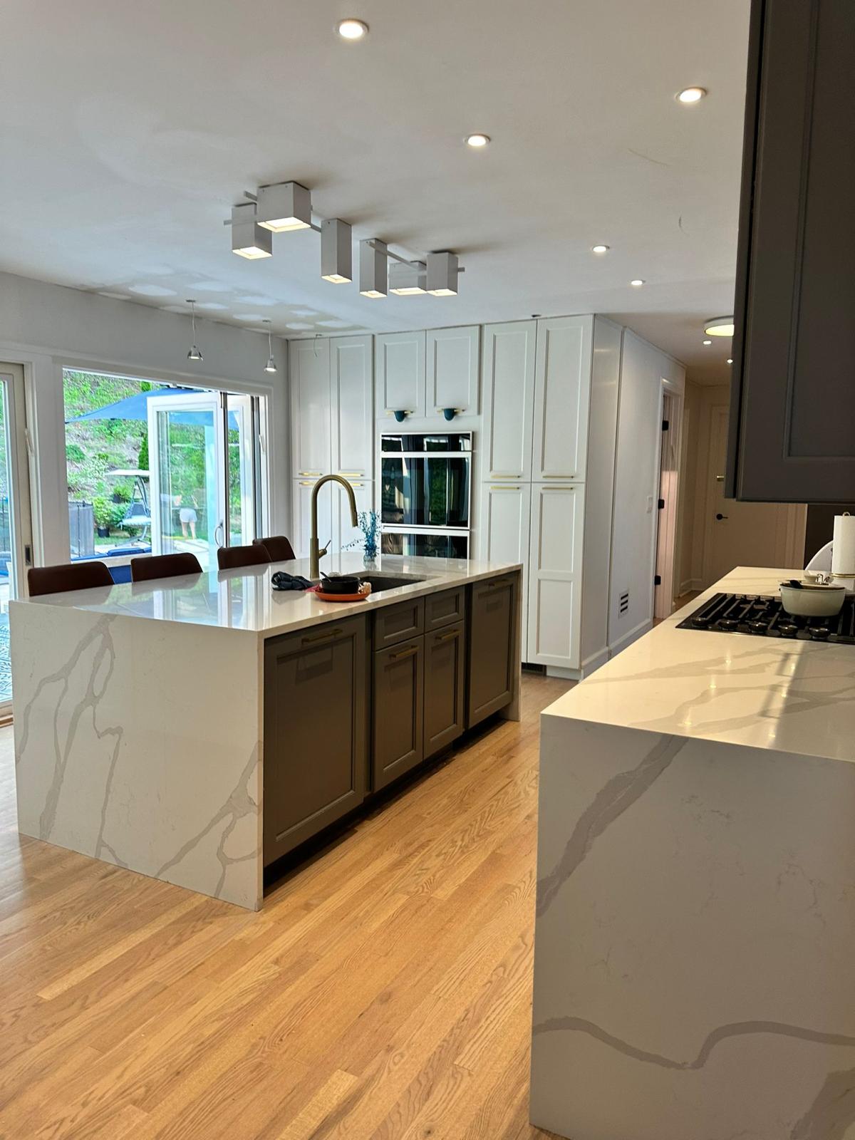 Double-island kitchen at 77 Pine Terrace.